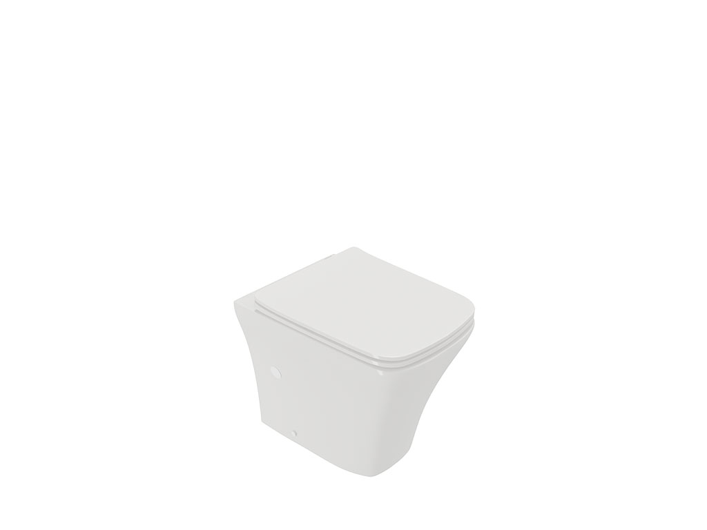 Taza a suelo pegada a pared